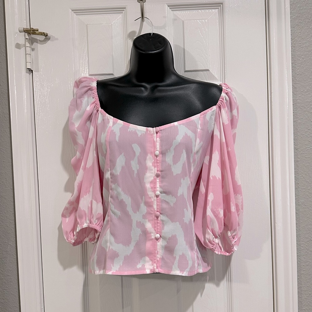 Buttoned down, off the shoulder blouse.